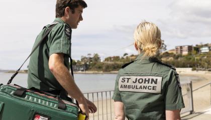 St John Event Health Services team walking along a promenade in Greens